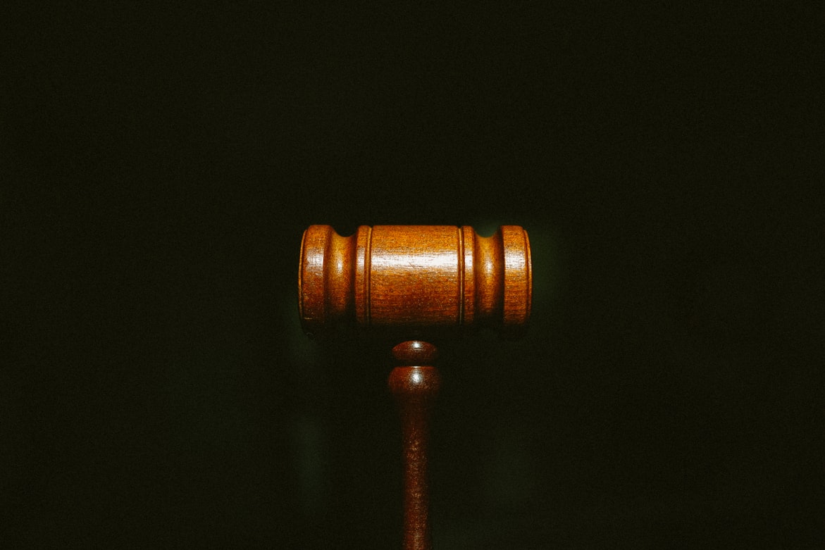 Gavel representing the legal jurisdictions of homeowners in a fee simple ownership