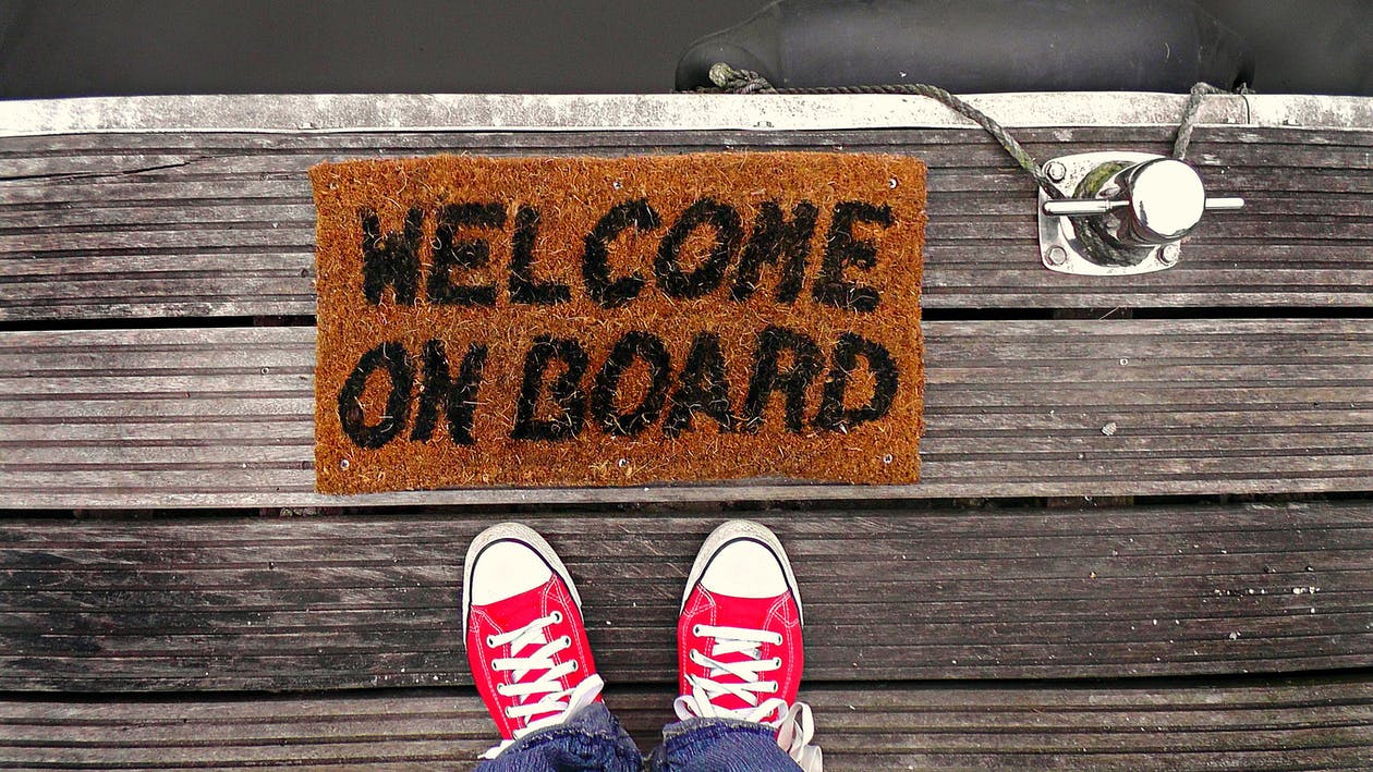doormat labeled "welcome on board"