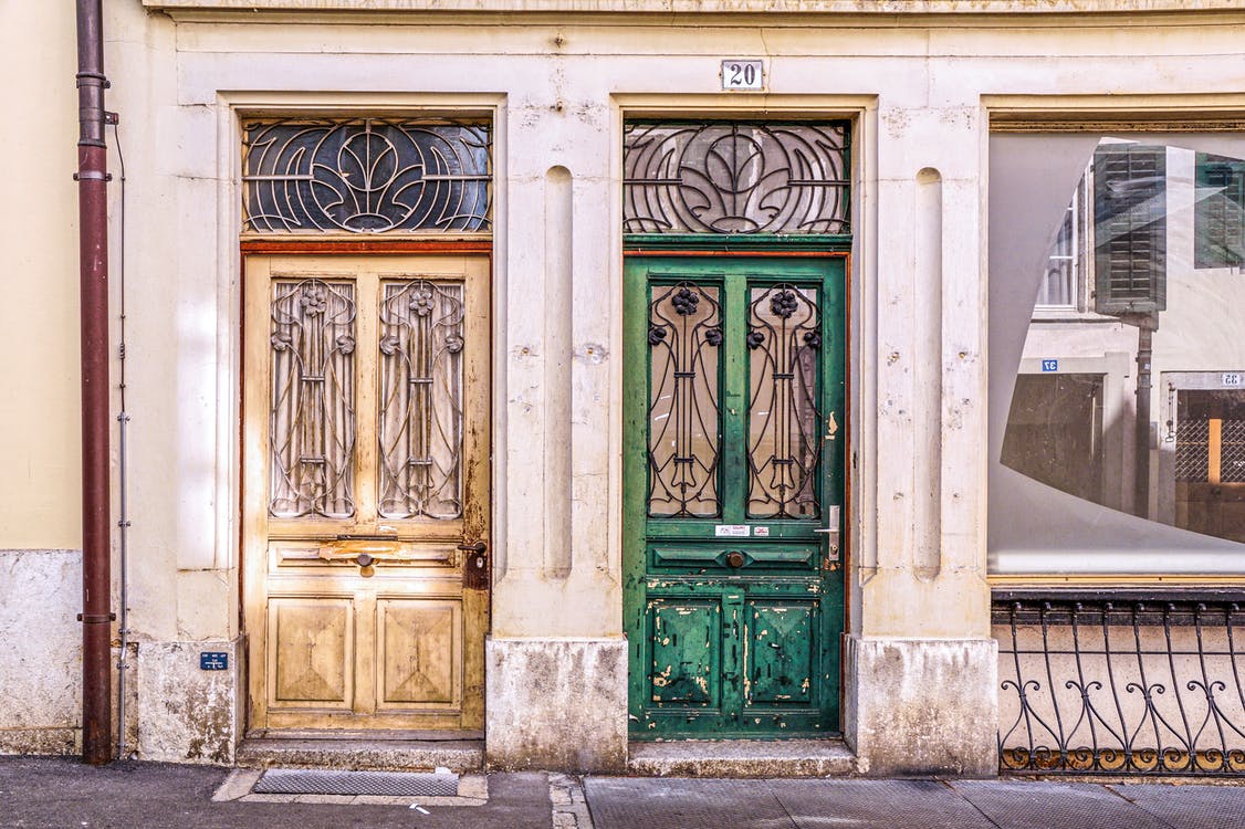 two beautiful old doors - yellow and green