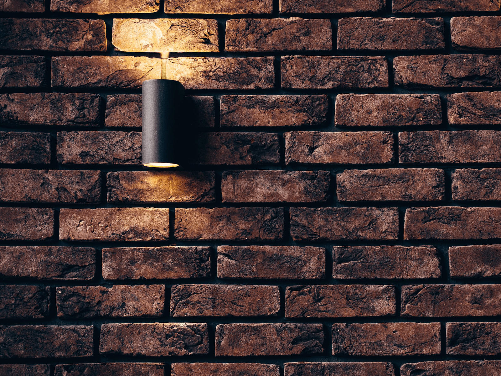 night light on a brick wall