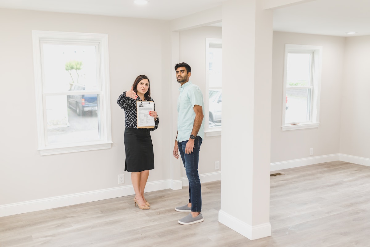 A Massachusetts real estate agent discussing with a potential buyer
